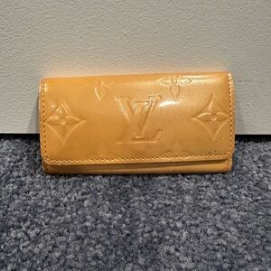 Louis Vuitton Embossed Leather key holder/ Wallet in Tan